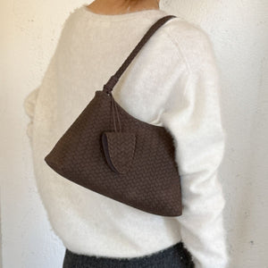 shoulder bag in dark brown featuring woven texture and crescent fit