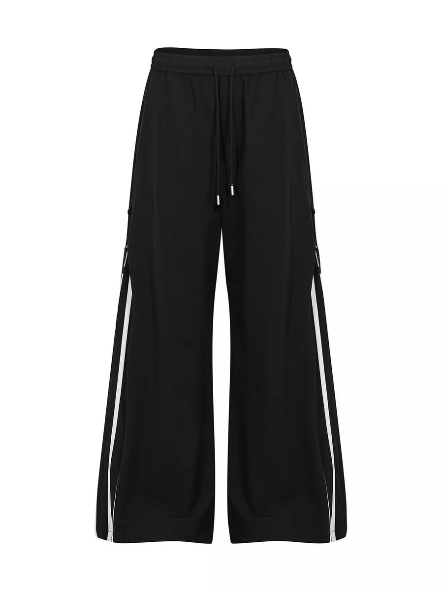 88% nylon, 12% spandex Care instructions: Machine wash cold wide-leg pants in Navy with wide-leg silhouette