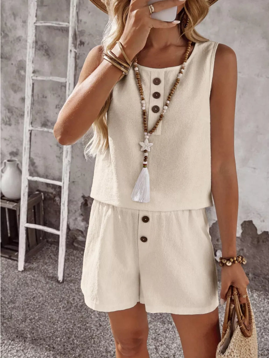 Apricot cotton two-piece set with decorative buttons on the top and shorts.