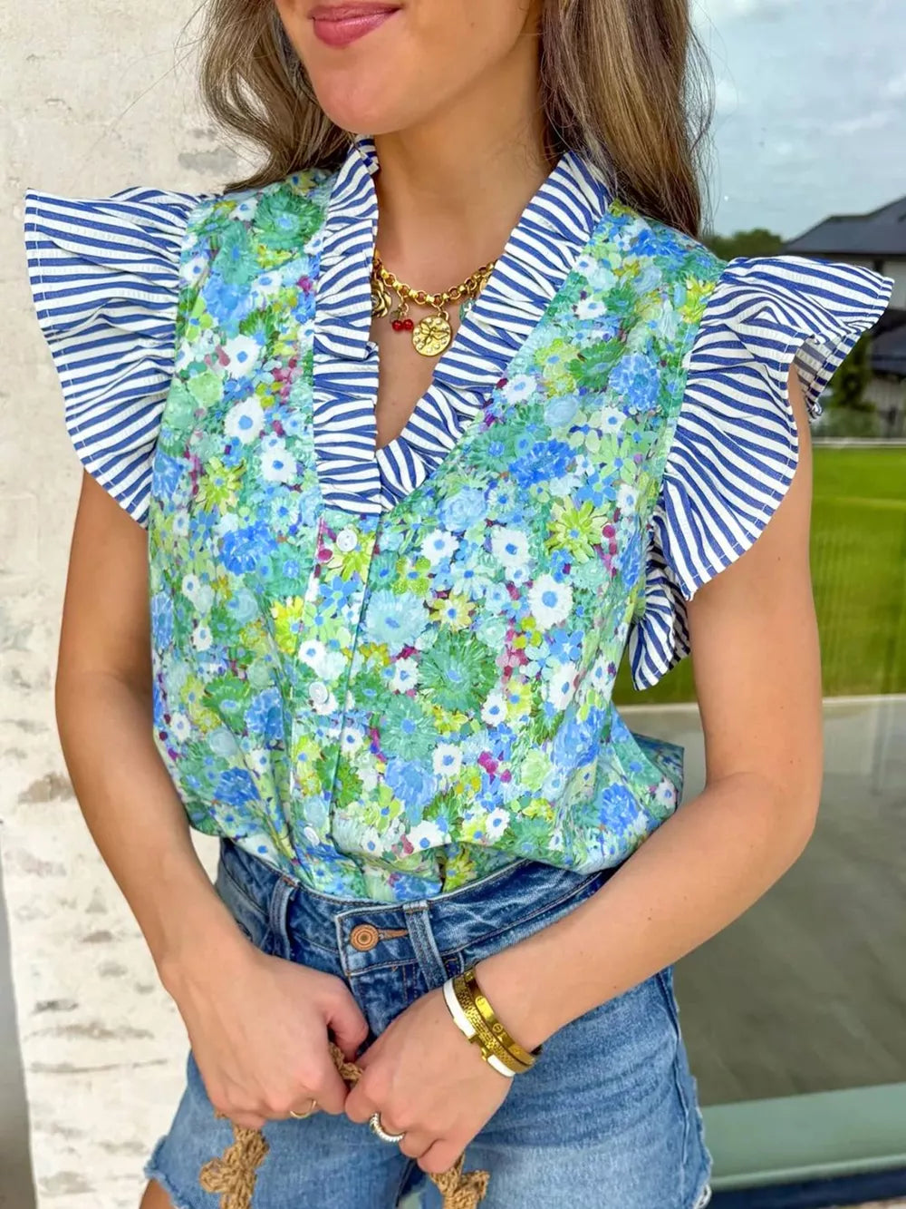 Floral Artistry V-neck Cotton Blouse with blue striped flutter sleeves