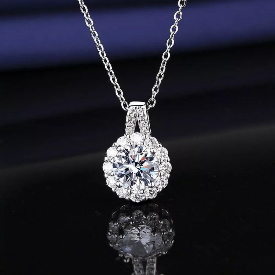 925 sterling silver,Moissanite Carat weight: 2ct Care instructions: Avoid wearin necklace in clear with N/A silhouette