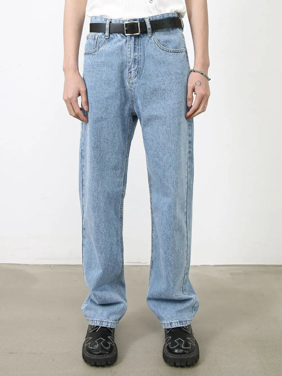 Light blue relaxed-fit denim jeans with subtle seam detail and a straight leg cut.