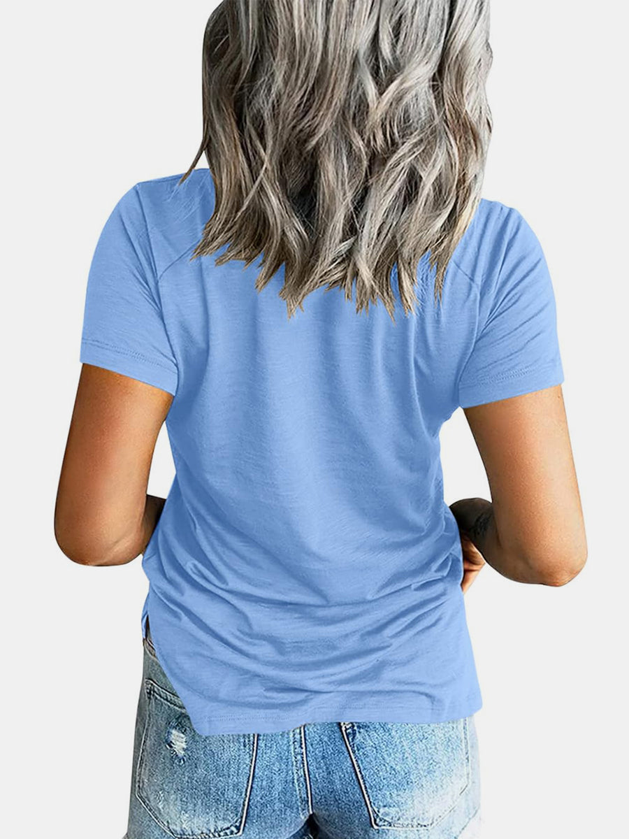 Light blue raglan pocket t-shirt with short sleeves and a casual fit.