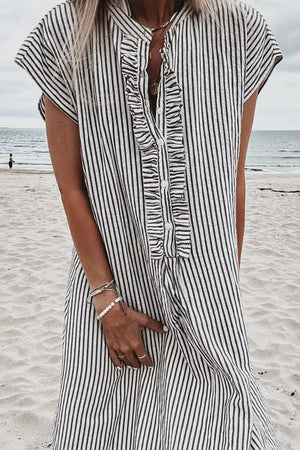 Black and white striped maternity swim dress with ruffle button-down front and cap sleeves.