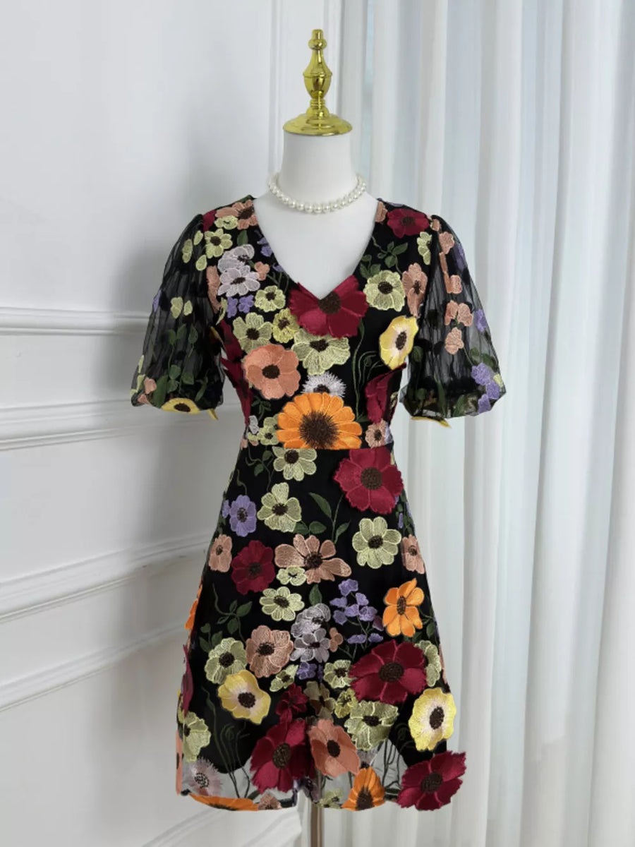 Black floral embroidered mini dress with V-neck and sheer puff sleeves