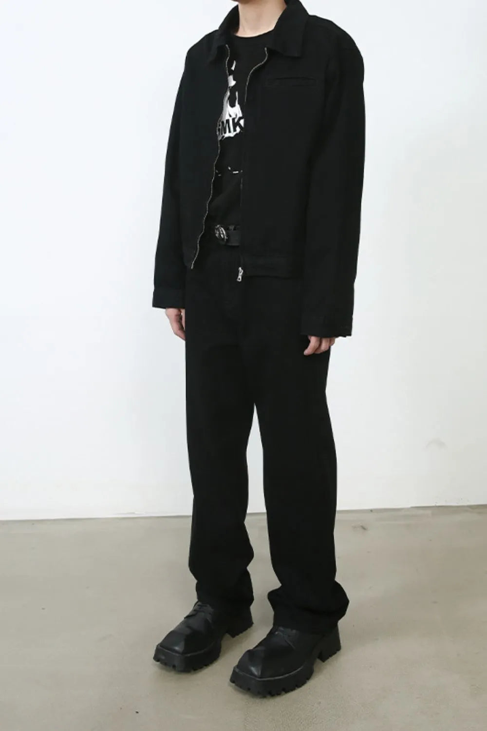 Relaxed fit black denim trousers with a straight leg and zip fly.