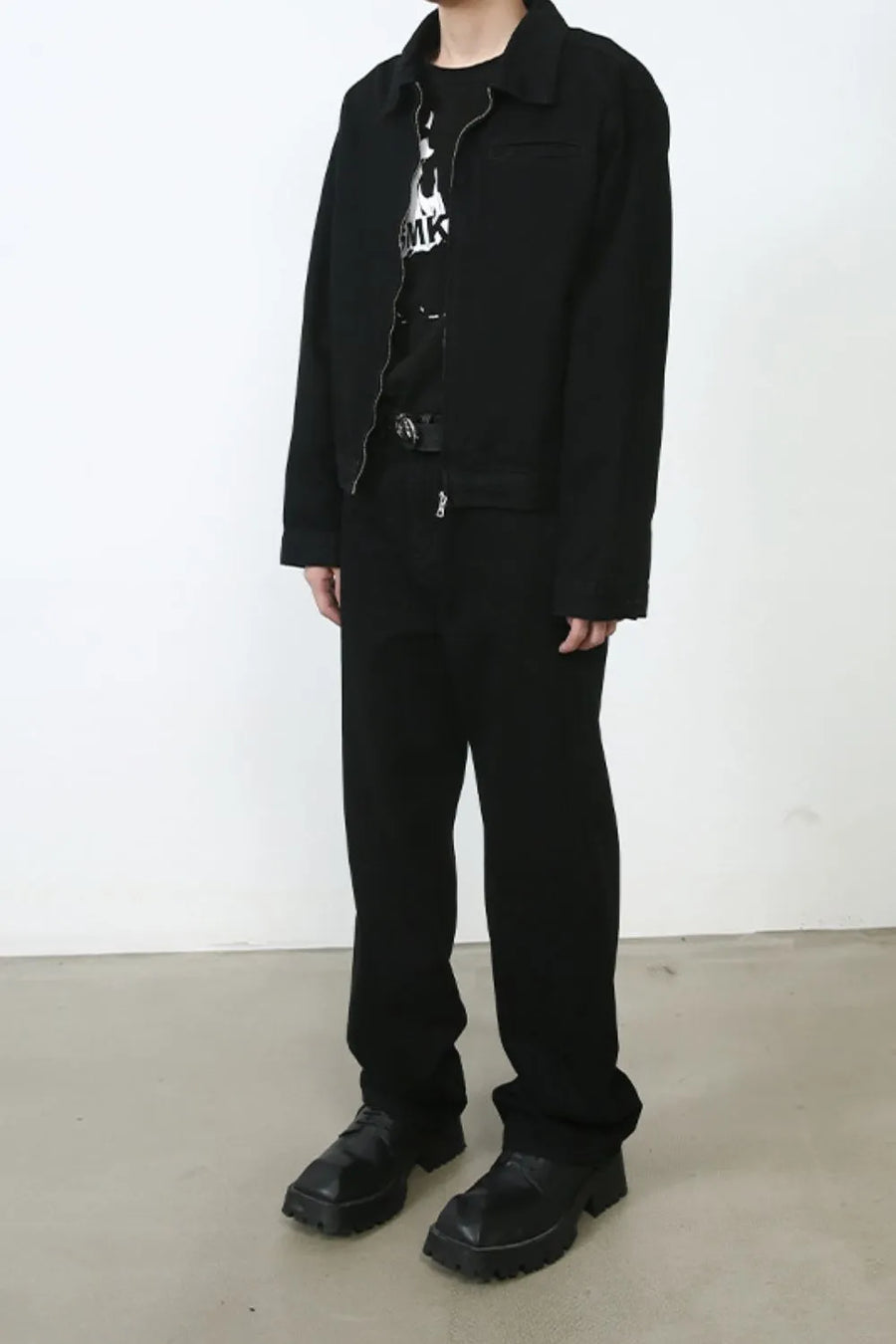 Relaxed fit black denim trousers with a straight leg and zip fly.
