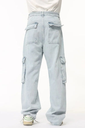 Baggy light wash denim cargo pants with multiple pockets and a relaxed fit.