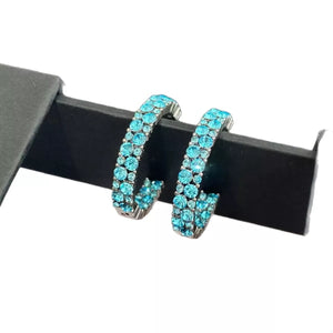Sparkling pastel blue hoop earrings with two rows of rhinestones on alloy.