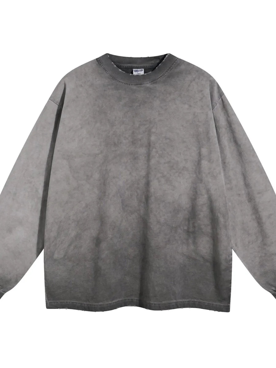 Vintage wash oversized crewneck sweatshirt in gray with a distressed neckline and hem.