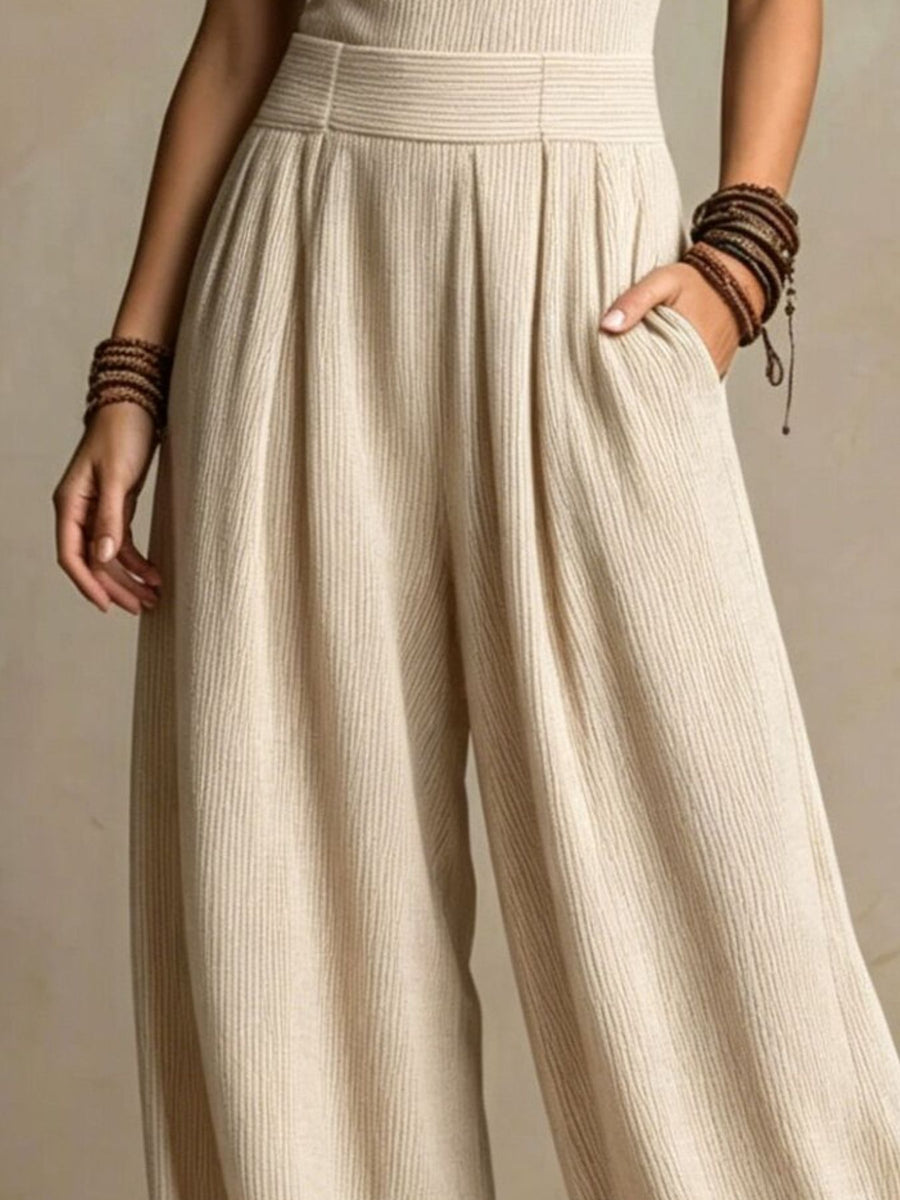 Full Size Sleeveless Halter Neck Wide-Leg Jumpsuit Plus Size in Dark Gray with pocketed