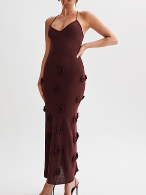 Brown knit maxi dress with 3D floral appliques and a halter neckline.