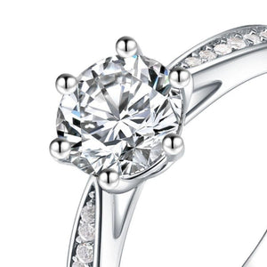 925 sterling silver,Moissanite Carat weight: 1ct Care instructions: Avoid wearin ring in clear with ring silhouette