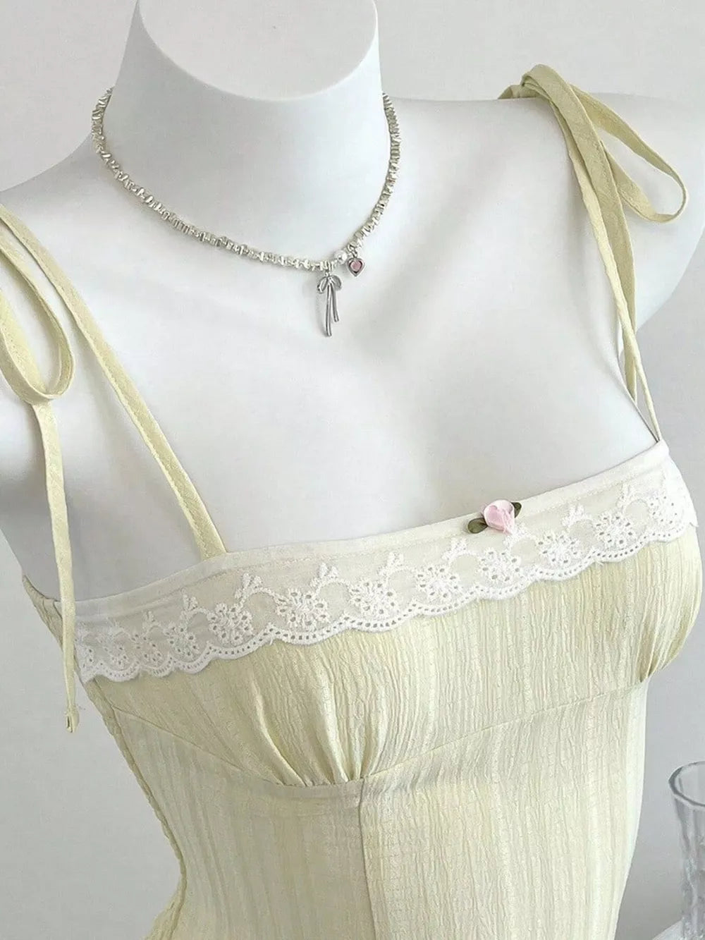 100% polyester Care instructions: Machine wash cold camisole in Burgundy with fitted silhouette
