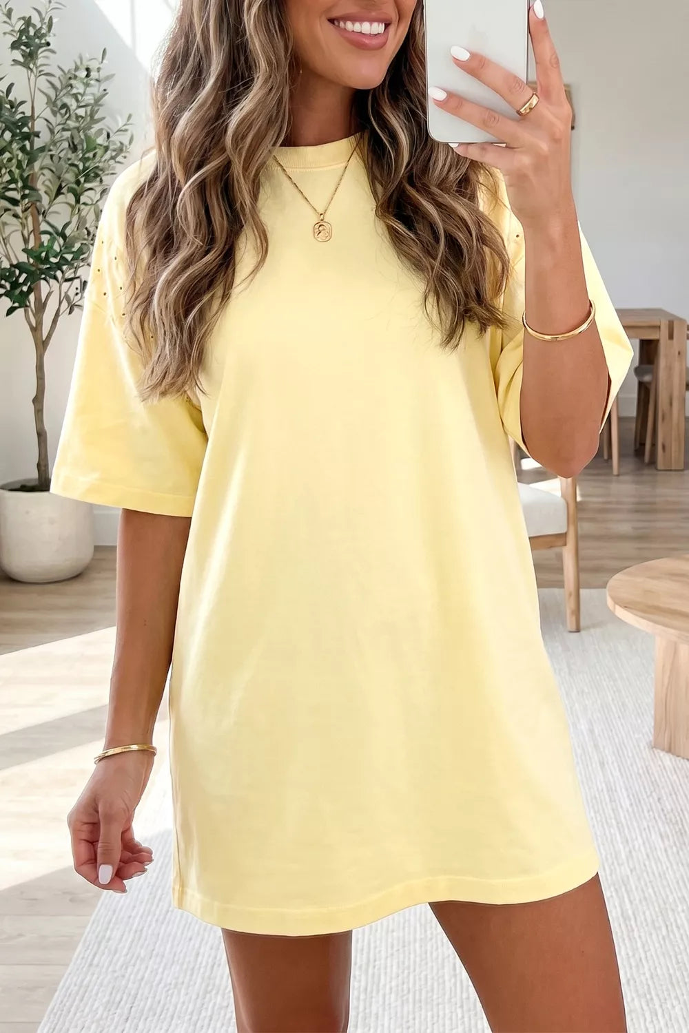 Yellow t-shirt dress with studded shoulder detail and short sleeves