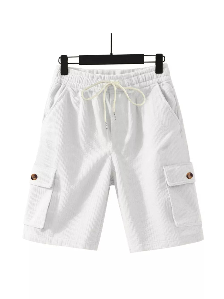White corduroy cargo shorts with drawstring waist and button-flap pockets.