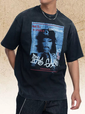 Black graphic tee with short sleeves and a crew neck, featuring a vintage-style portrait and text print.