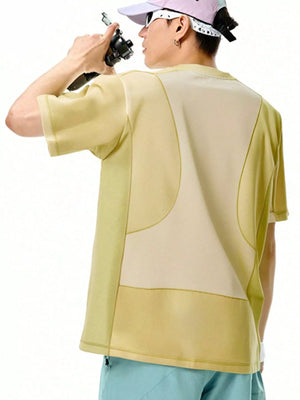 Relaxed fit t-shirt in yellow with contrast stitching and colorblock design.