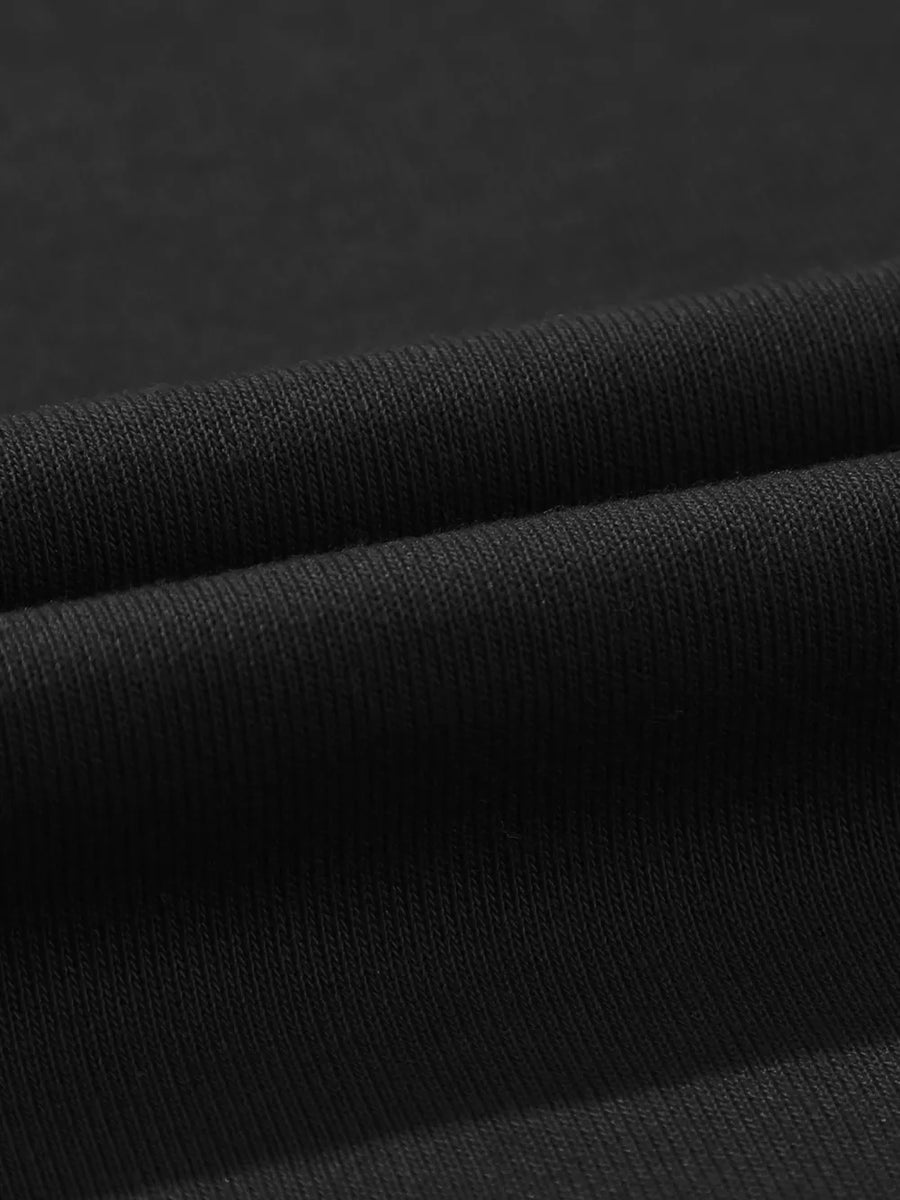 Black cotton maternity pants with a ribbed texture detail.