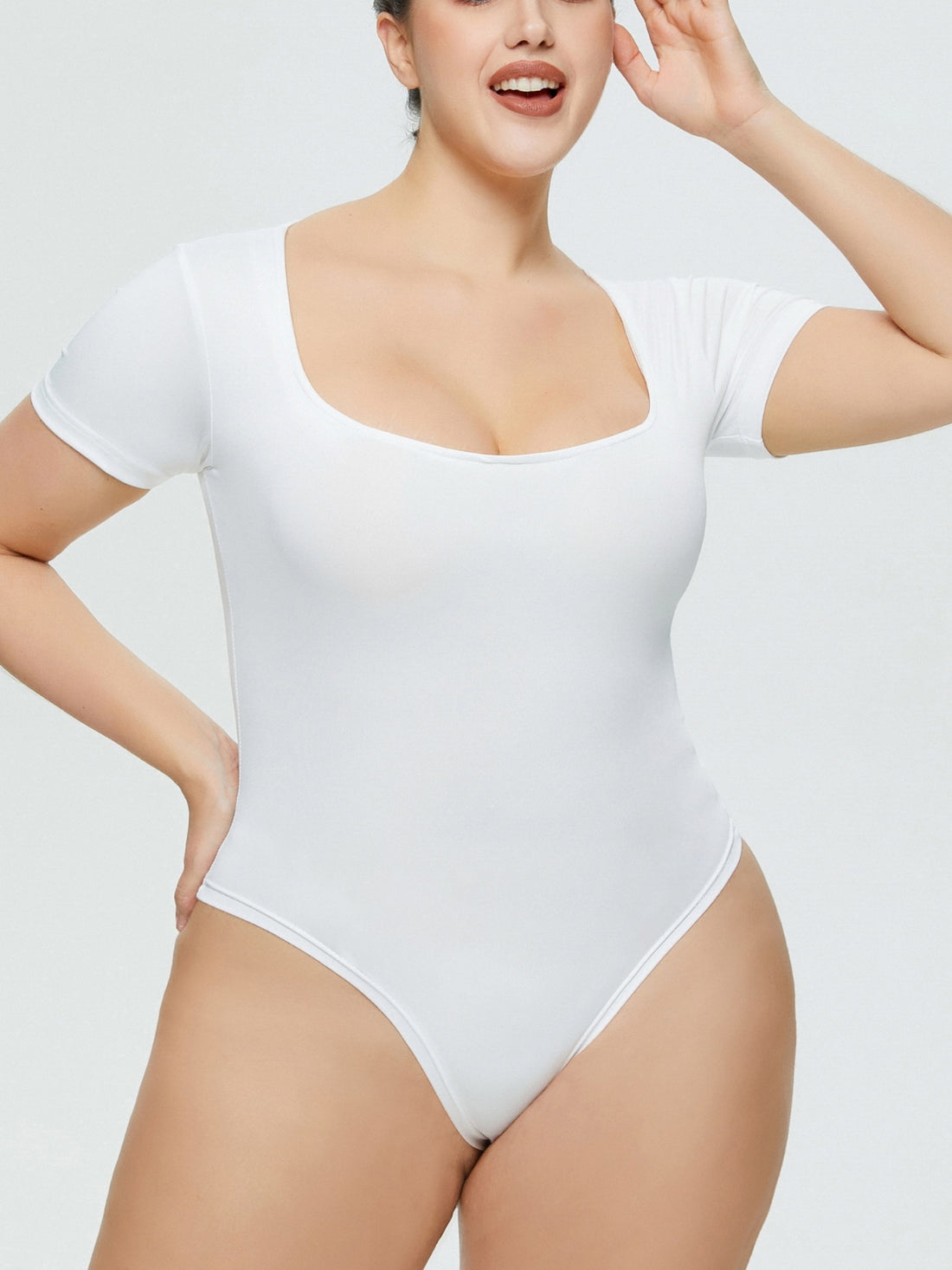 White square neck short sleeve bodysuit with a flattering fit