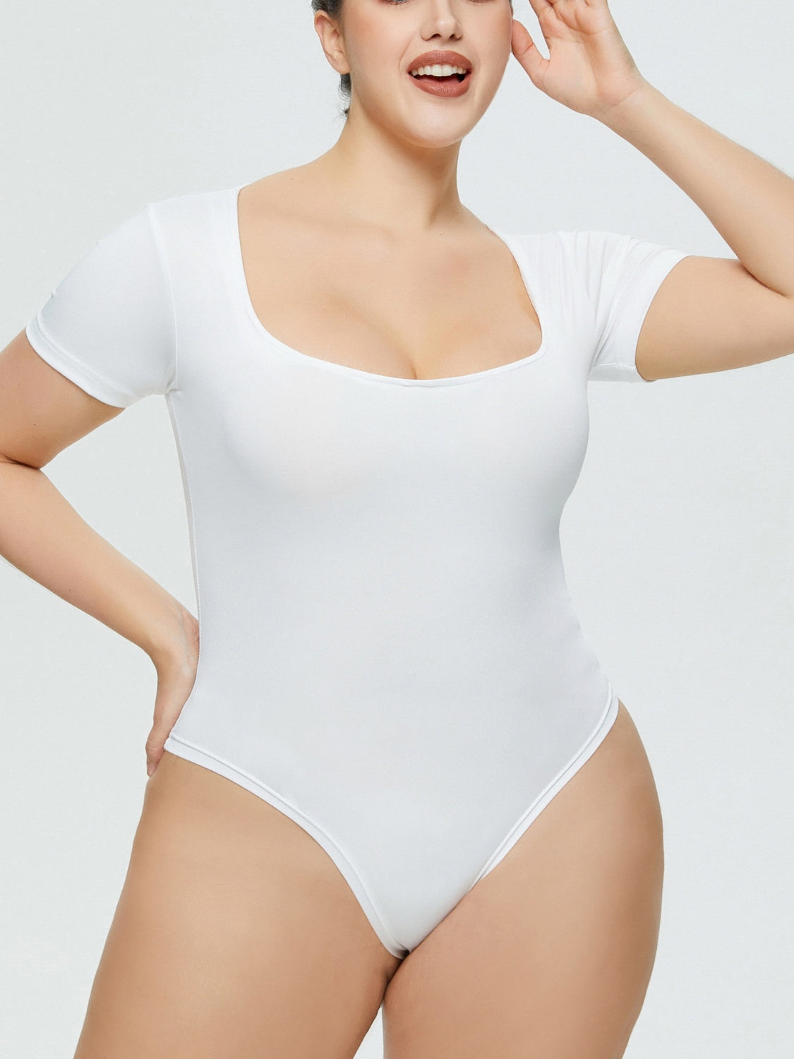 White square neck short sleeve bodysuit with a flattering fit