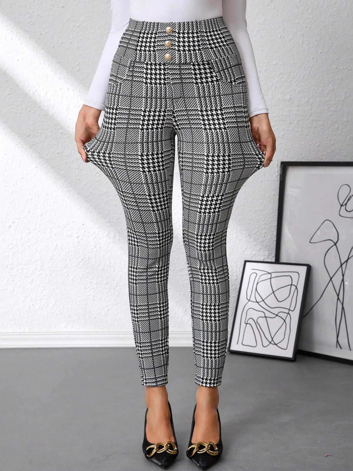 Plaid high waist slim fit ankle length pants with decorative buttons.