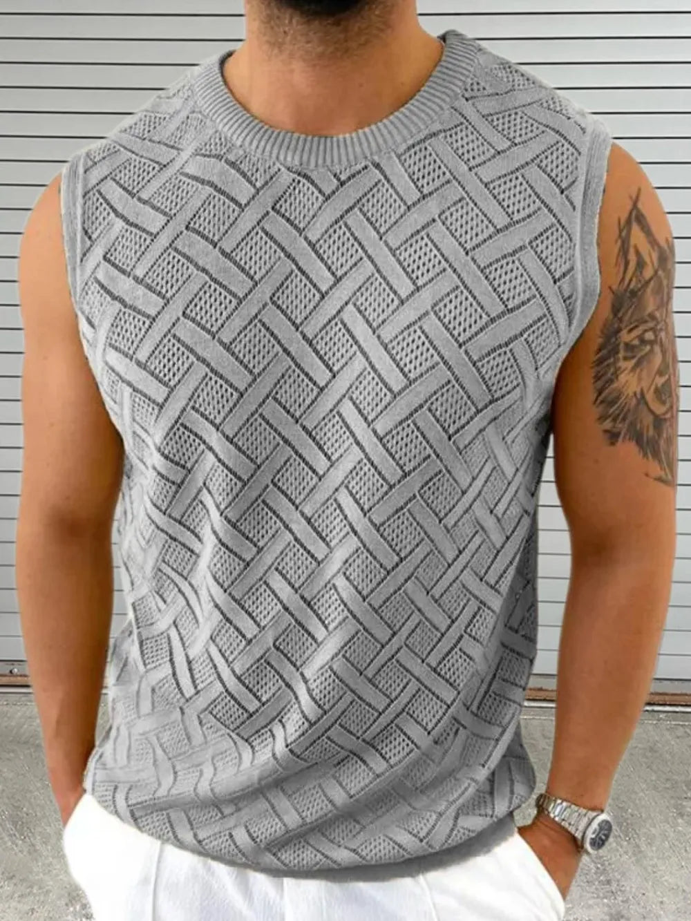 Gray knit sleeveless sweater with geometric pattern and crew neck