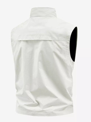 Men's white multi-pocket outdoor vest with stand collar and yoke detail.