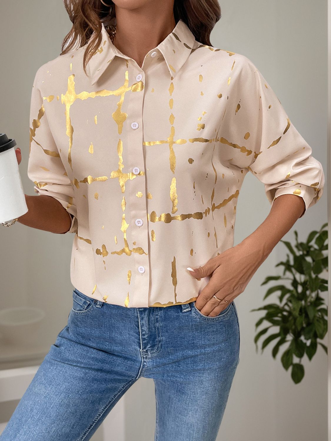 Tan blouse with gold brushstroke print and gathered sleeves