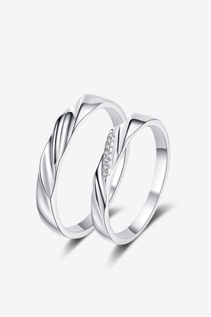 Twisted embrace silver ring set with diamonds, 925 sterling silver.