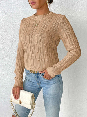Camel cable knit sweater with mock neck and long sleeves.
