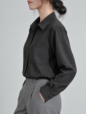 white button-up shirt with buttoned and long sleeve