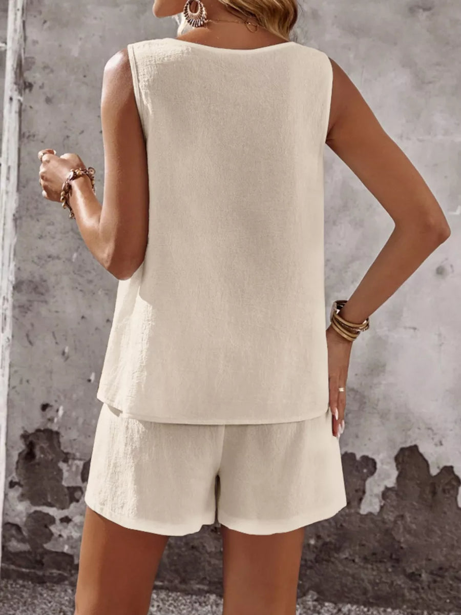 Apricot cotton two-piece set with sleeveless top and shorts.