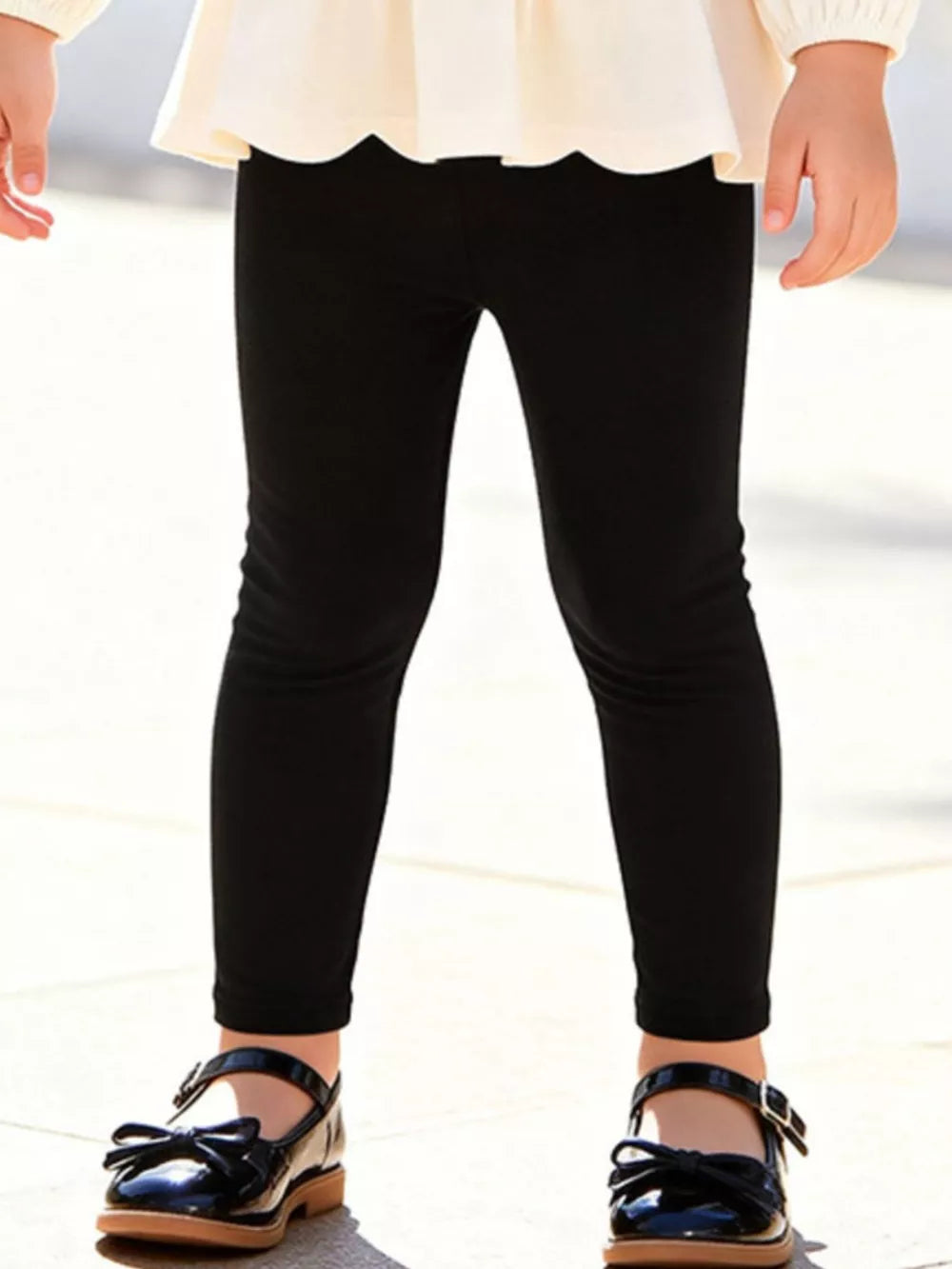 ivory peplum top with hip-length and pullover