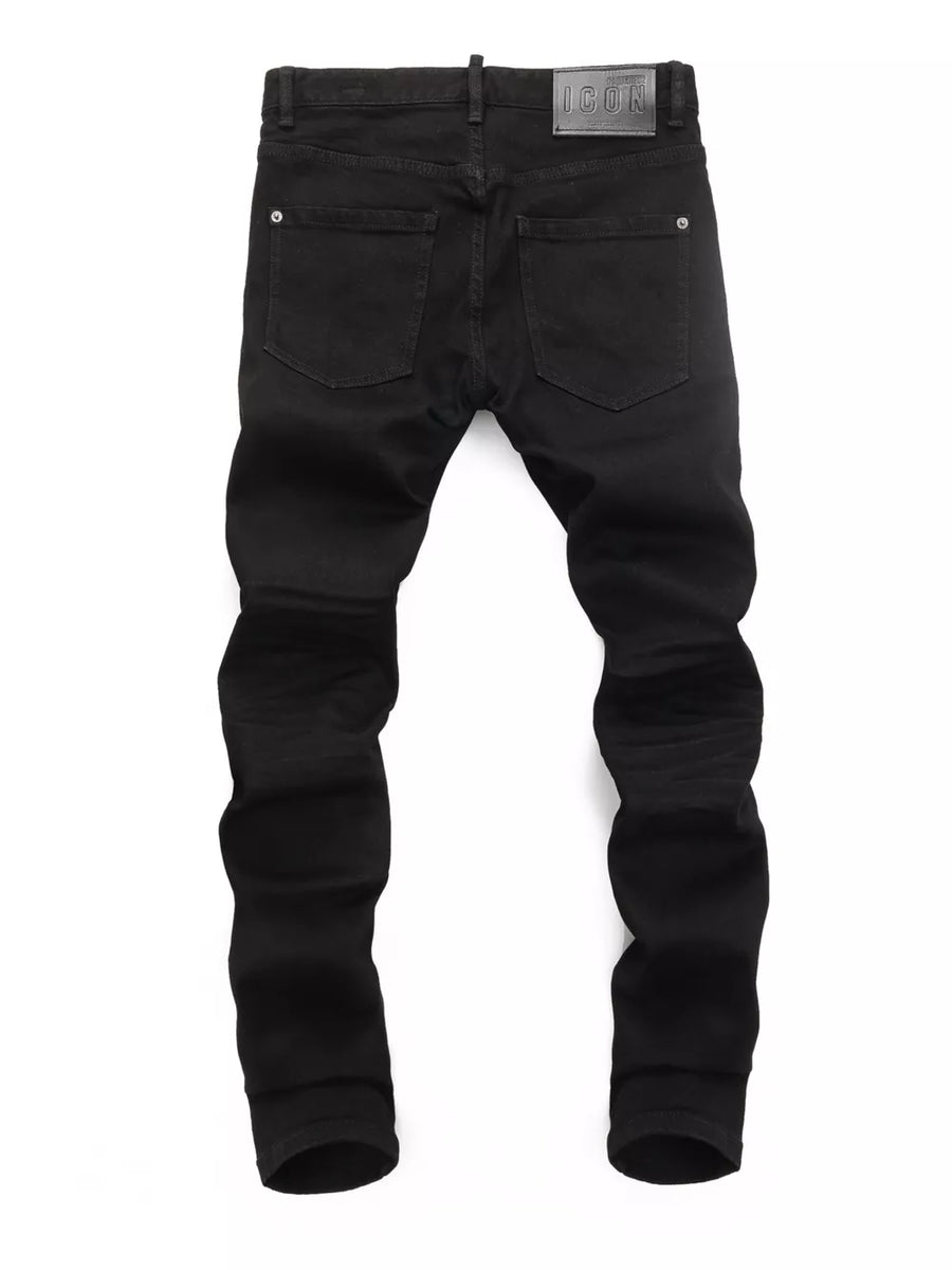 Black slim fit cotton jeans with two back pockets and a leather logo patch.