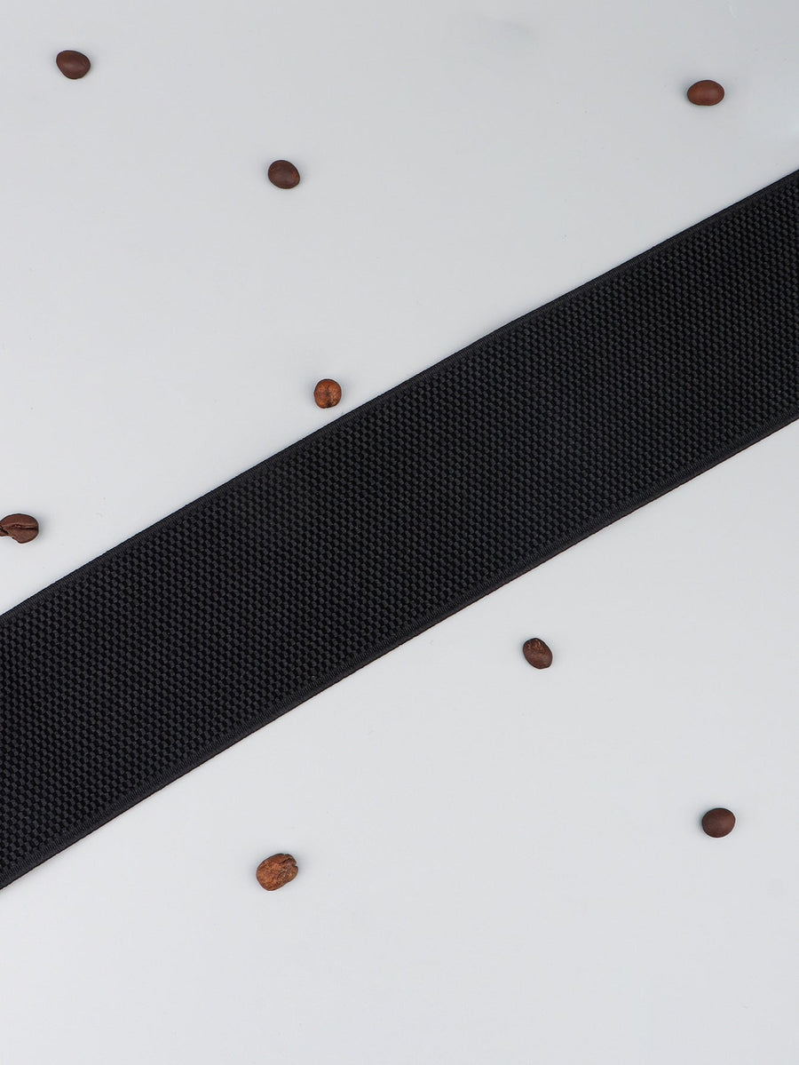 Black elastic belt with textured weave and gold hardware detail