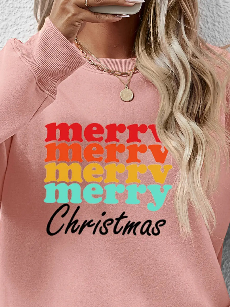 Blush Pink crewneck sweatshirt with retro "Merry Christmas" graphic in red, orange, yellow, and teal.