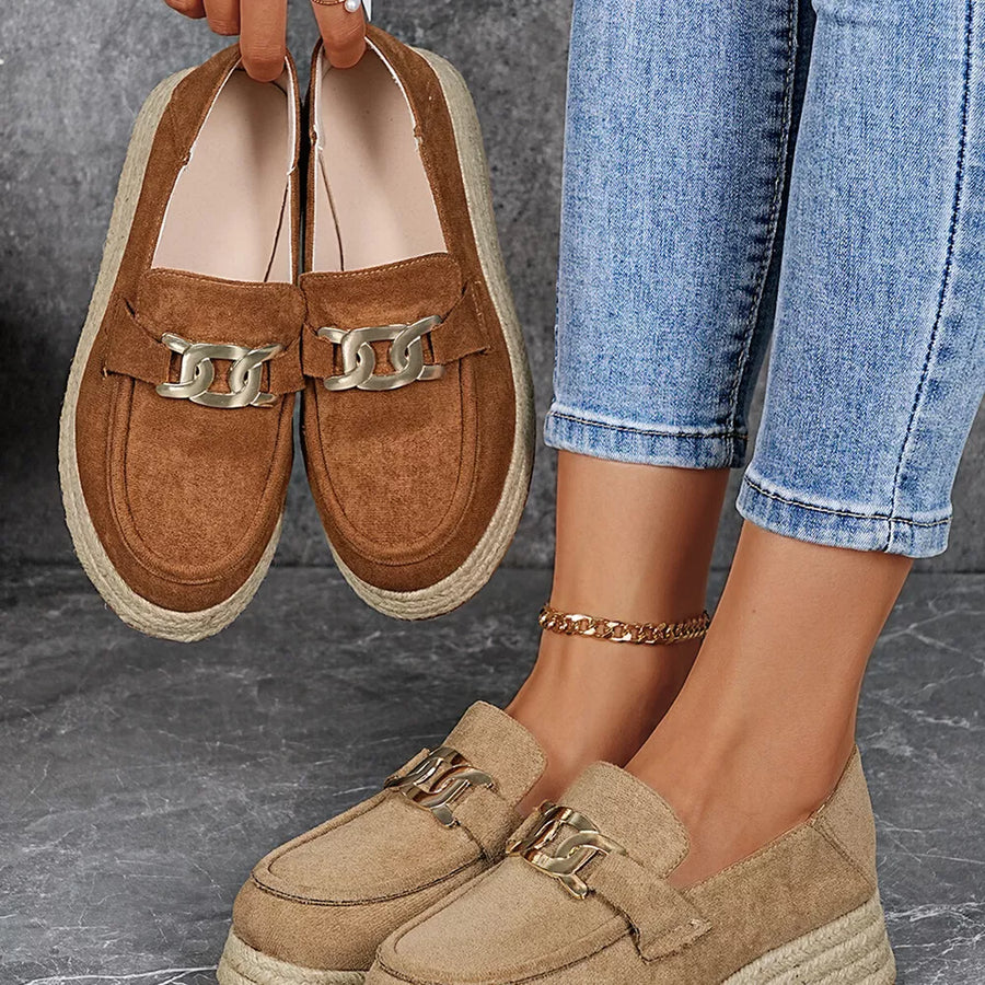 Chic brown round toe platform loafers with gold chain detail and espadrille sole.
