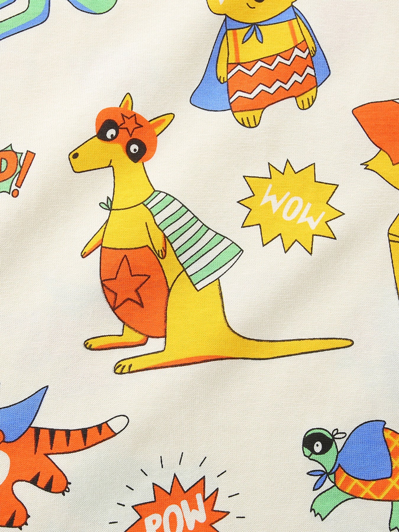 Children's crew neck t-shirt with a fun animal superhero print on beige fabric.