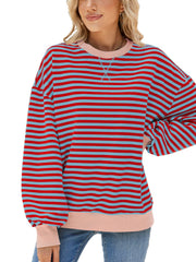 Striped crew neck sweatshirt in red and light blue with pink trim.
