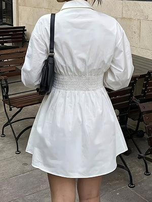 white mini dress with collared and lantern sleeve