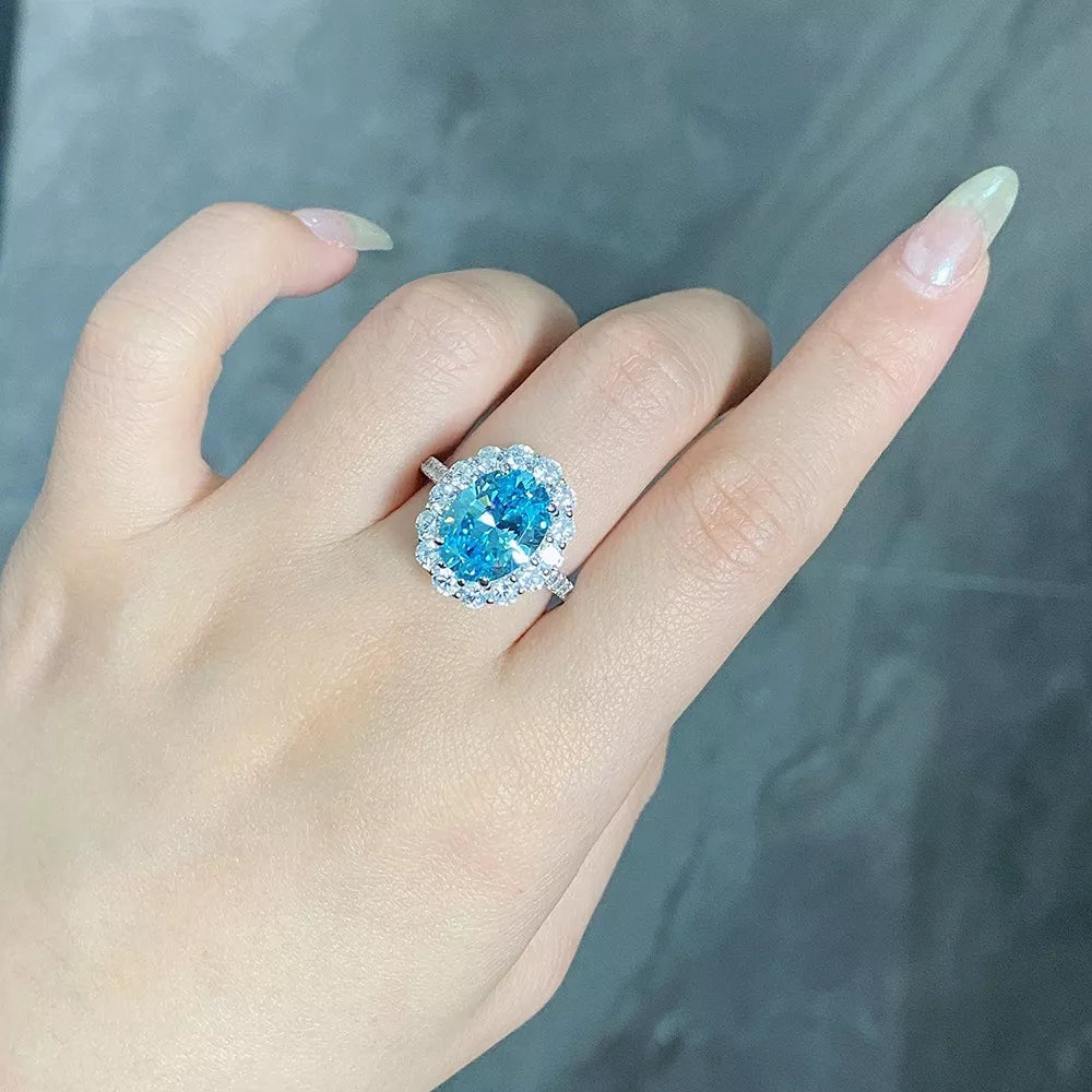 ring in aquamarine featuring oval cut stone and fitted fit