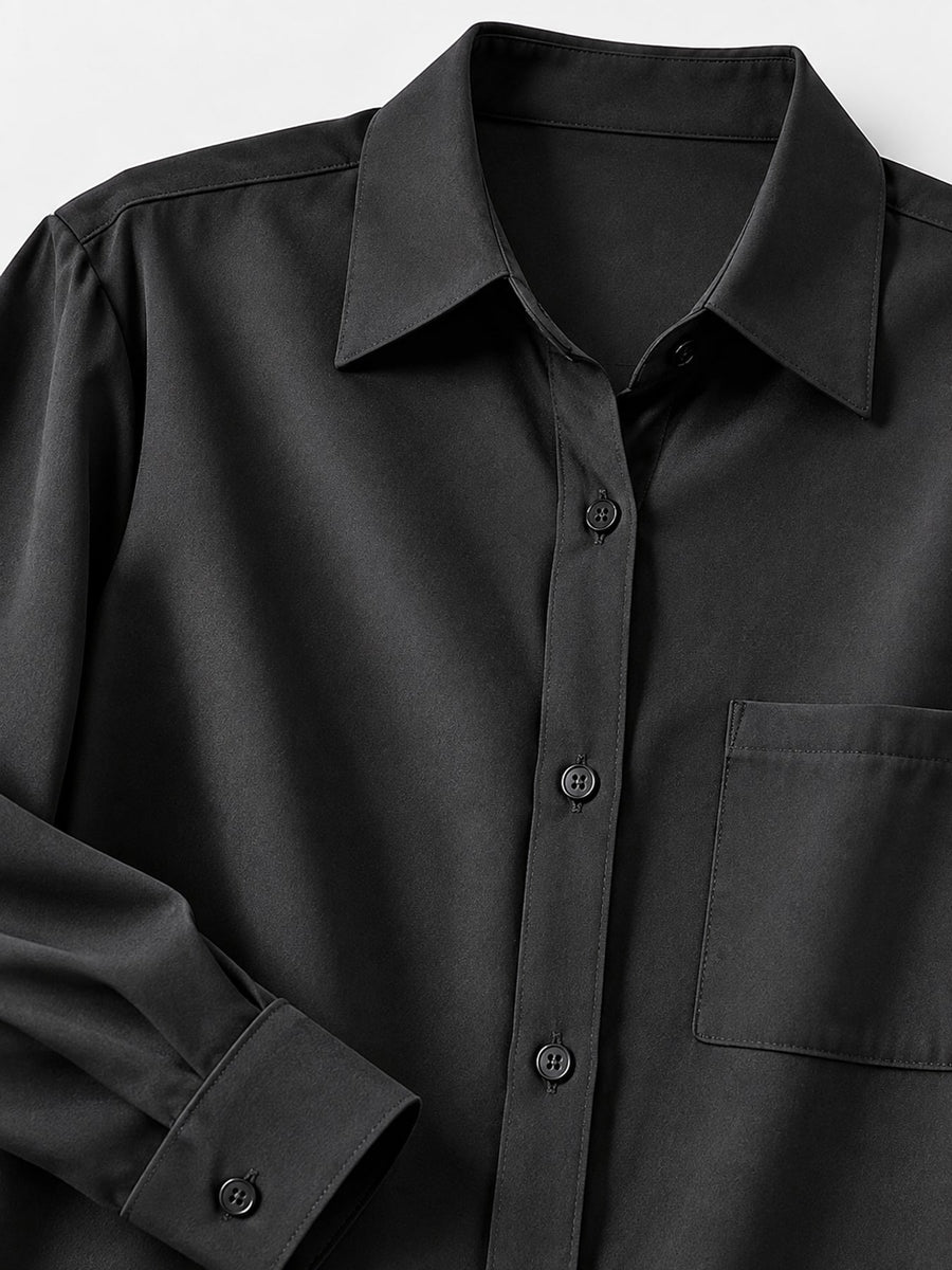 White relaxed button-up shirt with collared
