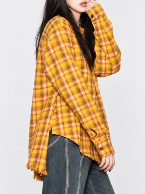 orange button-up shirt featuring buttoned and plaid