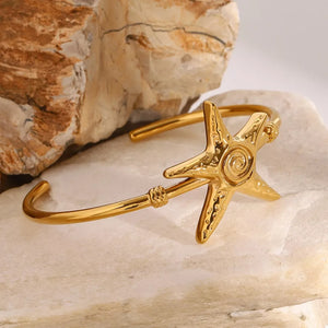 bracelet featuring starfish motif in gold with 18K Gold-Plated, Stainless Steel Care instructions: Avoid wearing during