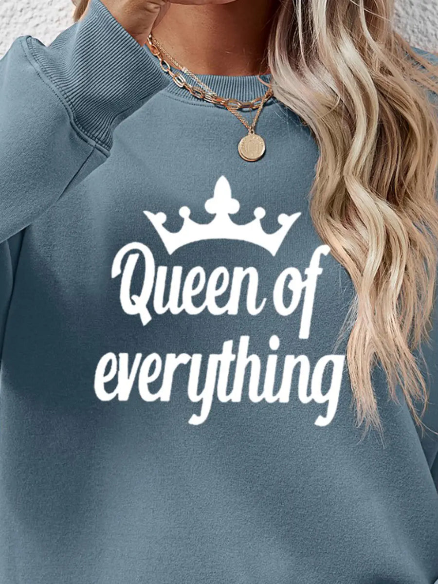 Misty Blue sweatshirt with white Queen of Everything graphic and crown detail.