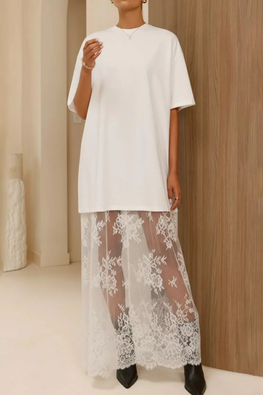 White cotton t-shirt dress with sheer lace midi skirt and floral embroidery.