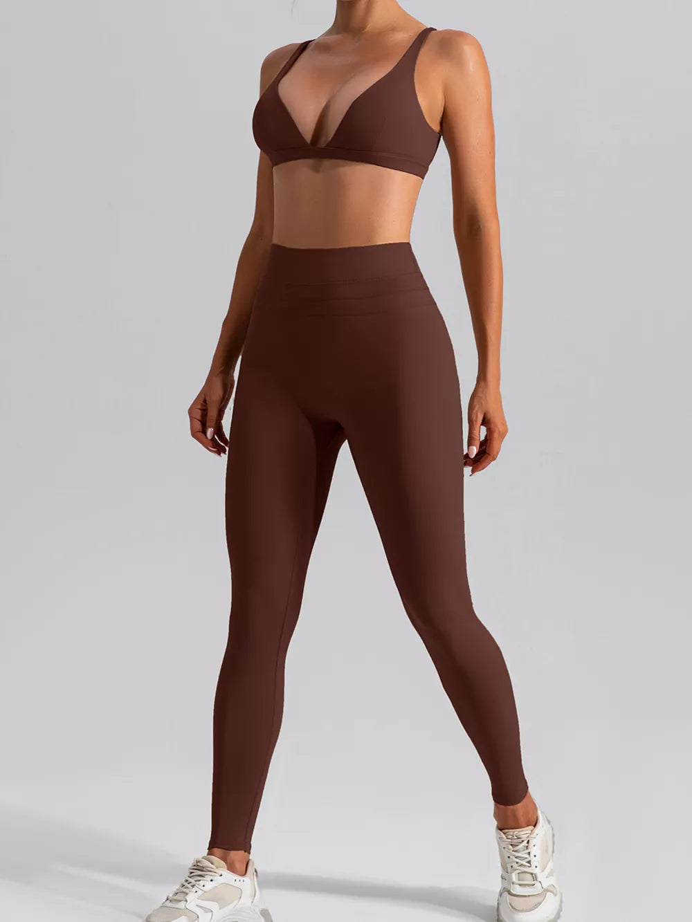 active set in D.brown with deep v-neck and sleeveless