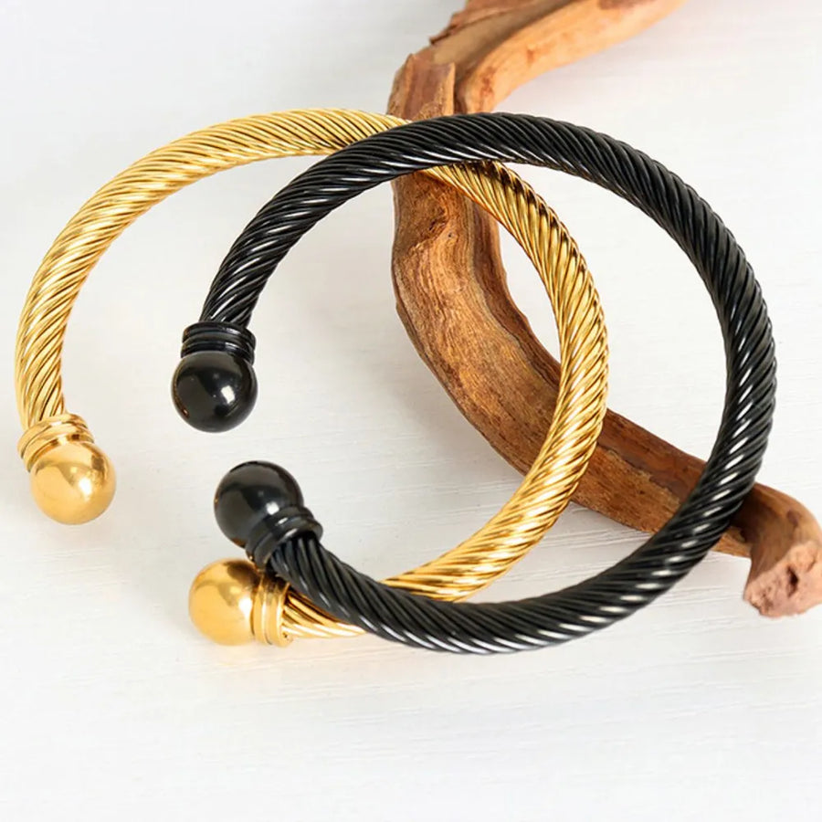 bracelet featuring twisted cable in Silver with 18K Gold-Plated,Stainless Steel Care instructions: Avoid wearing during