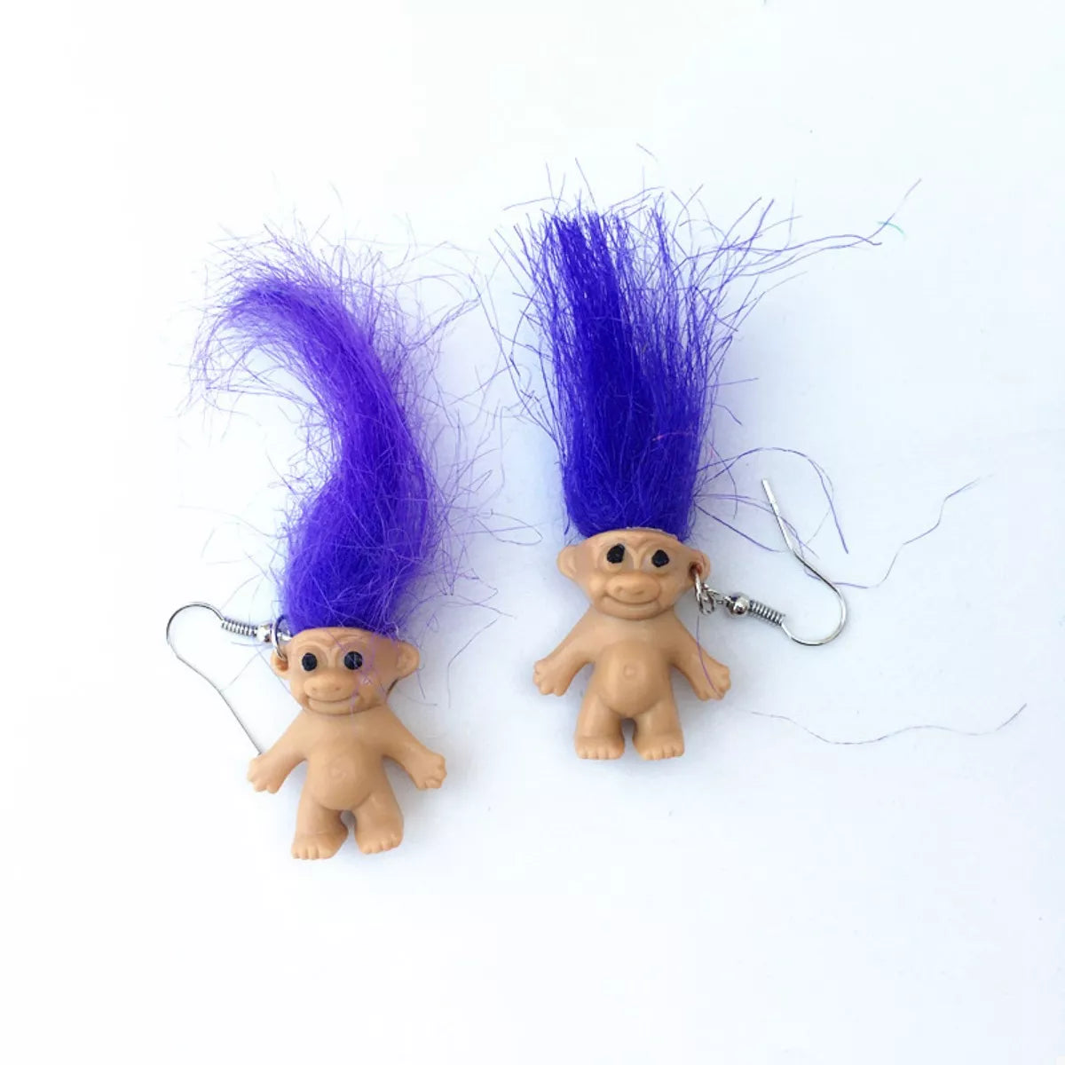 Purple troll doll dangle earrings with fuzzy hair